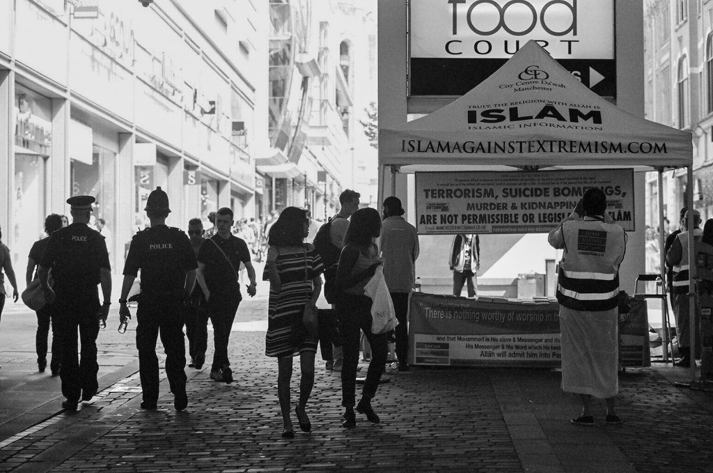 A black and white image of a Muslim protest against terrorism by Islam Against Extremism on Market Street, Manchester. Taken days after the deadly Arena bomb of May 22, 2017 that killed 22 people.